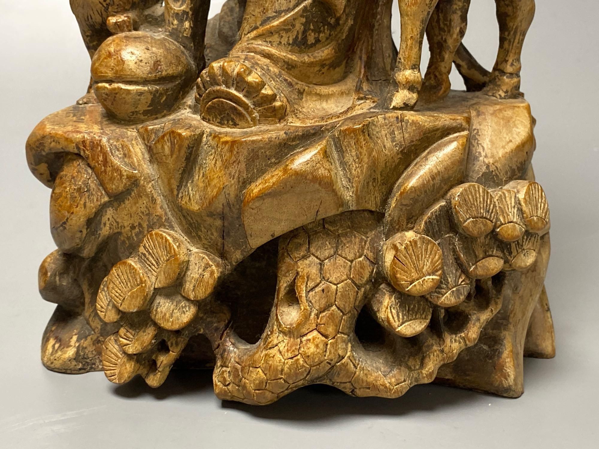 A Chinese carved hardwood figure of Shou Lao, 53cm